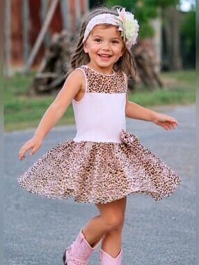 Girls Pink jersey top With Chetah Print Mesh Inset ,Skirt , and Bow.
